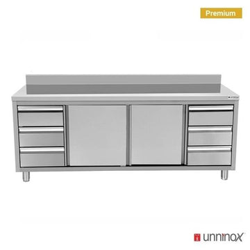 RVS werktafel met schuifdeuren, 6 laden en opstand, 700 mm Unninox